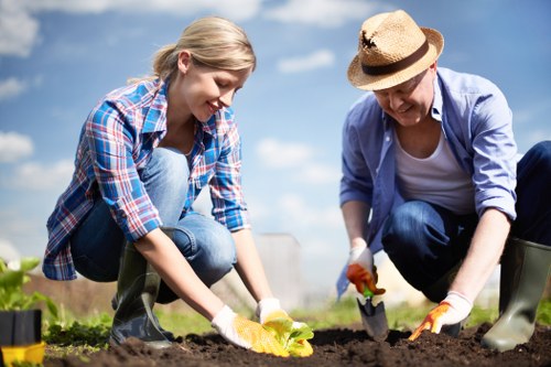 Manager assessing landscaping work details as part of a complaint
